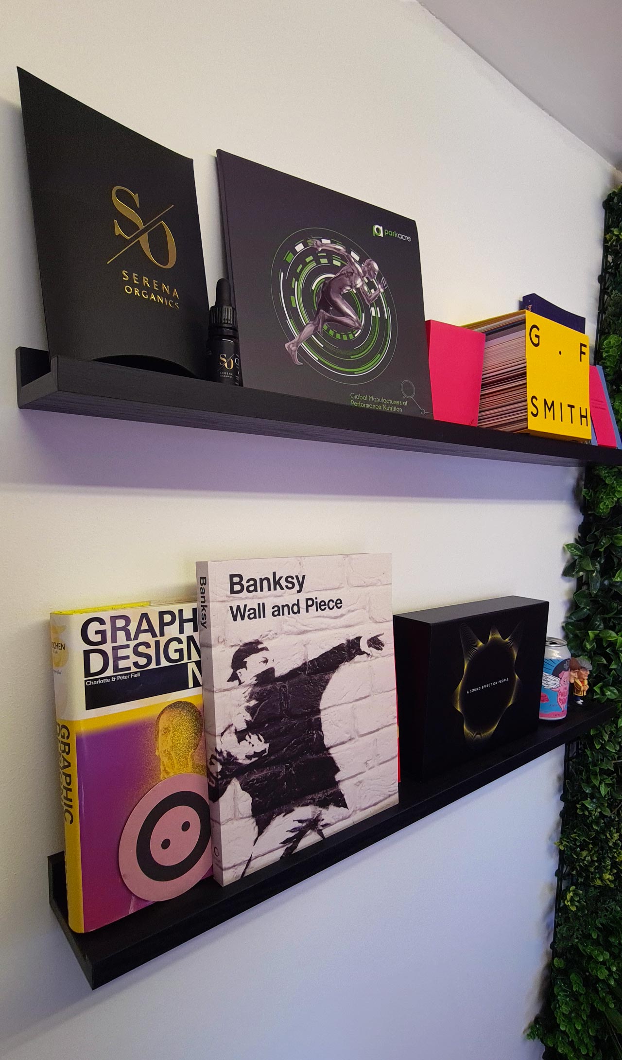 various graphic design and marketing books on a shelf