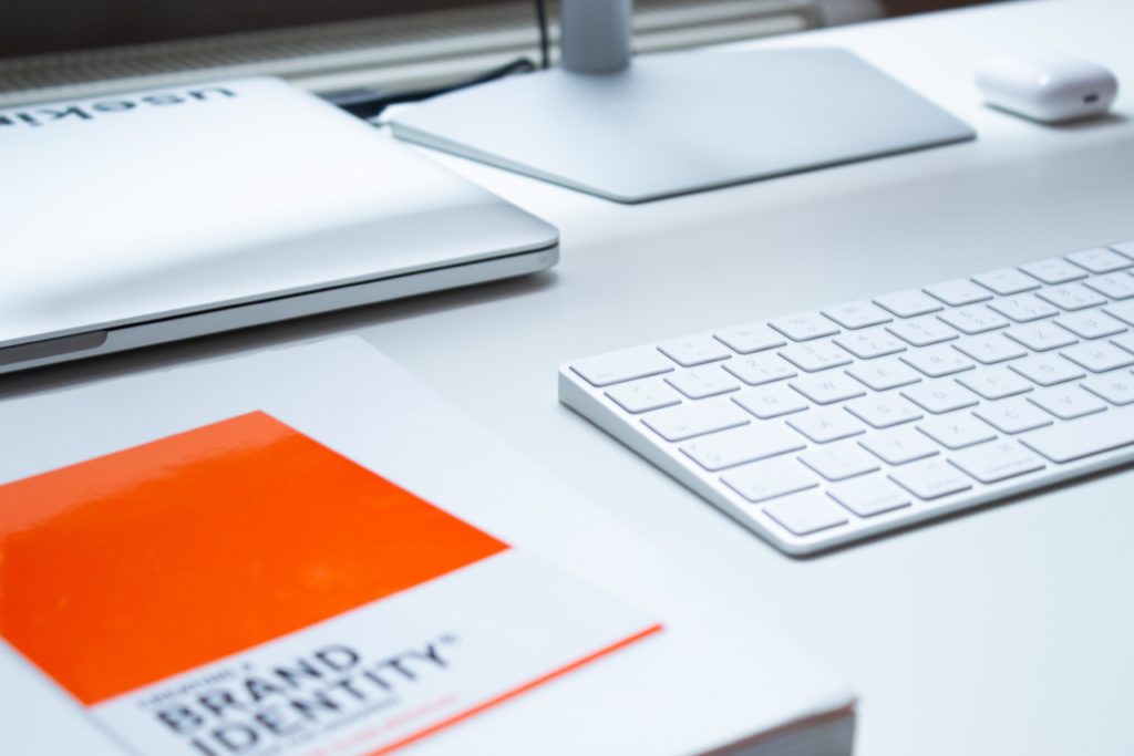 A brand identity book sitting on a desk