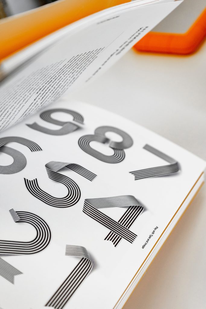 A typography book showing various typography numbers