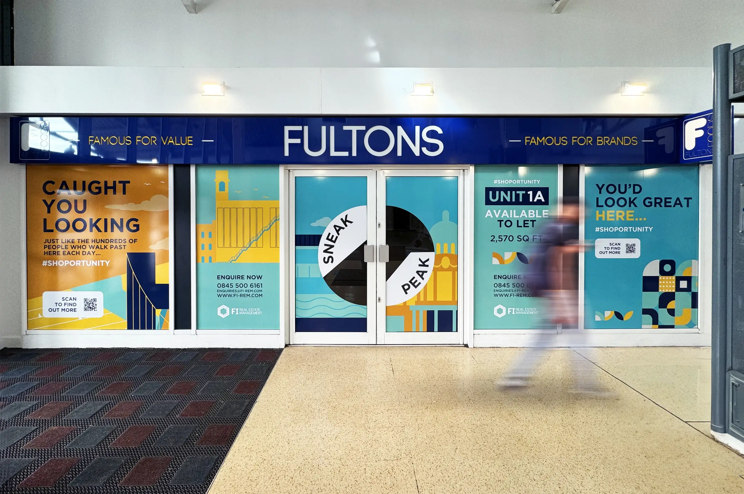 North Point Shopping Centre window graphics showcasing a unit for rent. A passer-by walks past in blurred motion.